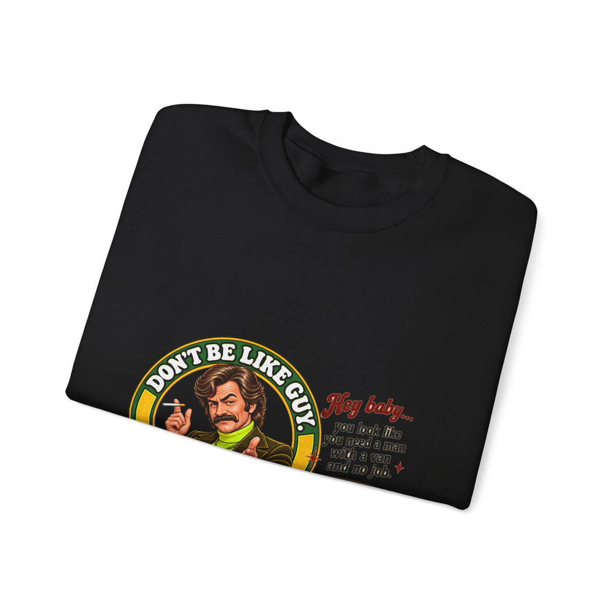Folded black crewneck sweatshirt with 'Don't Be Like Guy' graphic visible