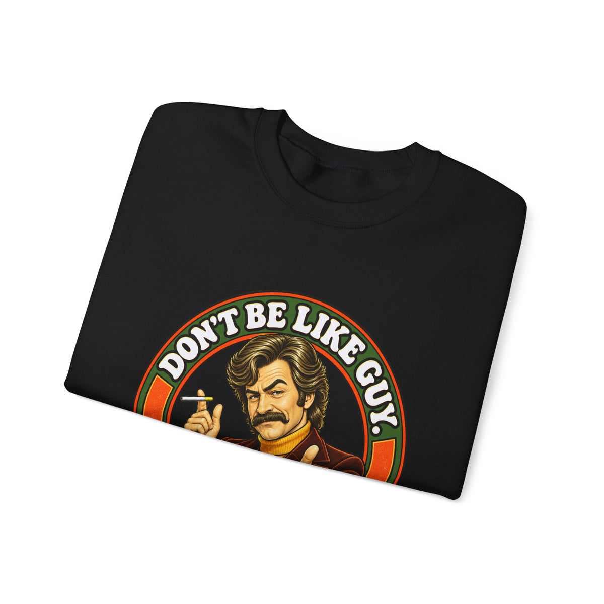 Black sweatshirt folded, 'Don't Be Like Guy' graphic visible