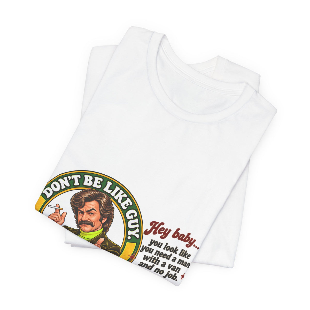 Folded white Don't Be Like Guy graphic T-shirt with visible design