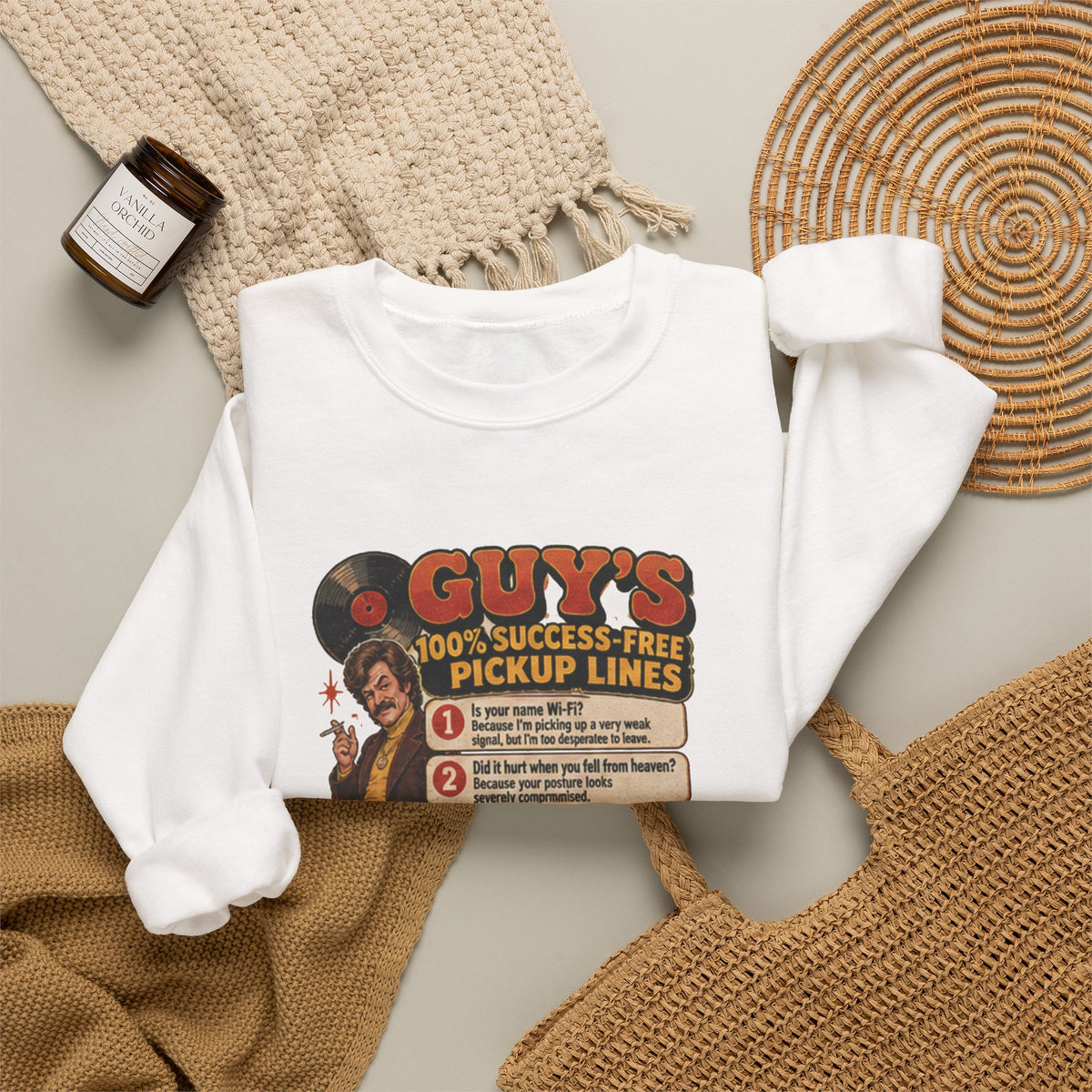 White crewneck with pickup lines graphic styled with cozy textured items
