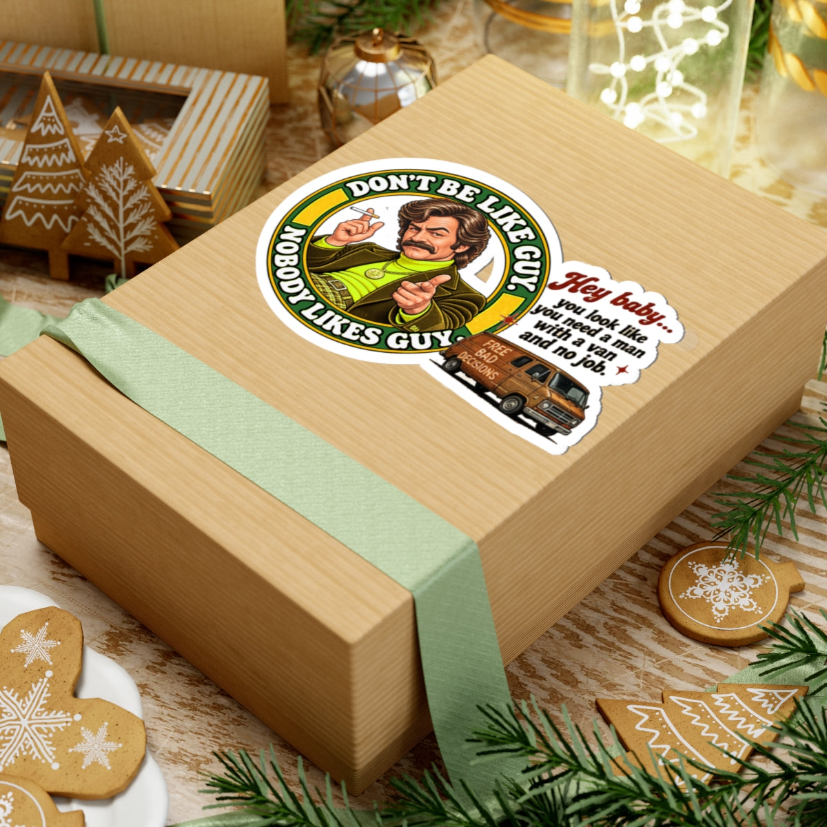 Retro 'Nobody Likes Guy' sticker on holiday gift box with cookies