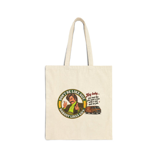 Natural canvas tote bag with 'Don't Be Like Guy, Nobody Likes Guy' retro funny print
