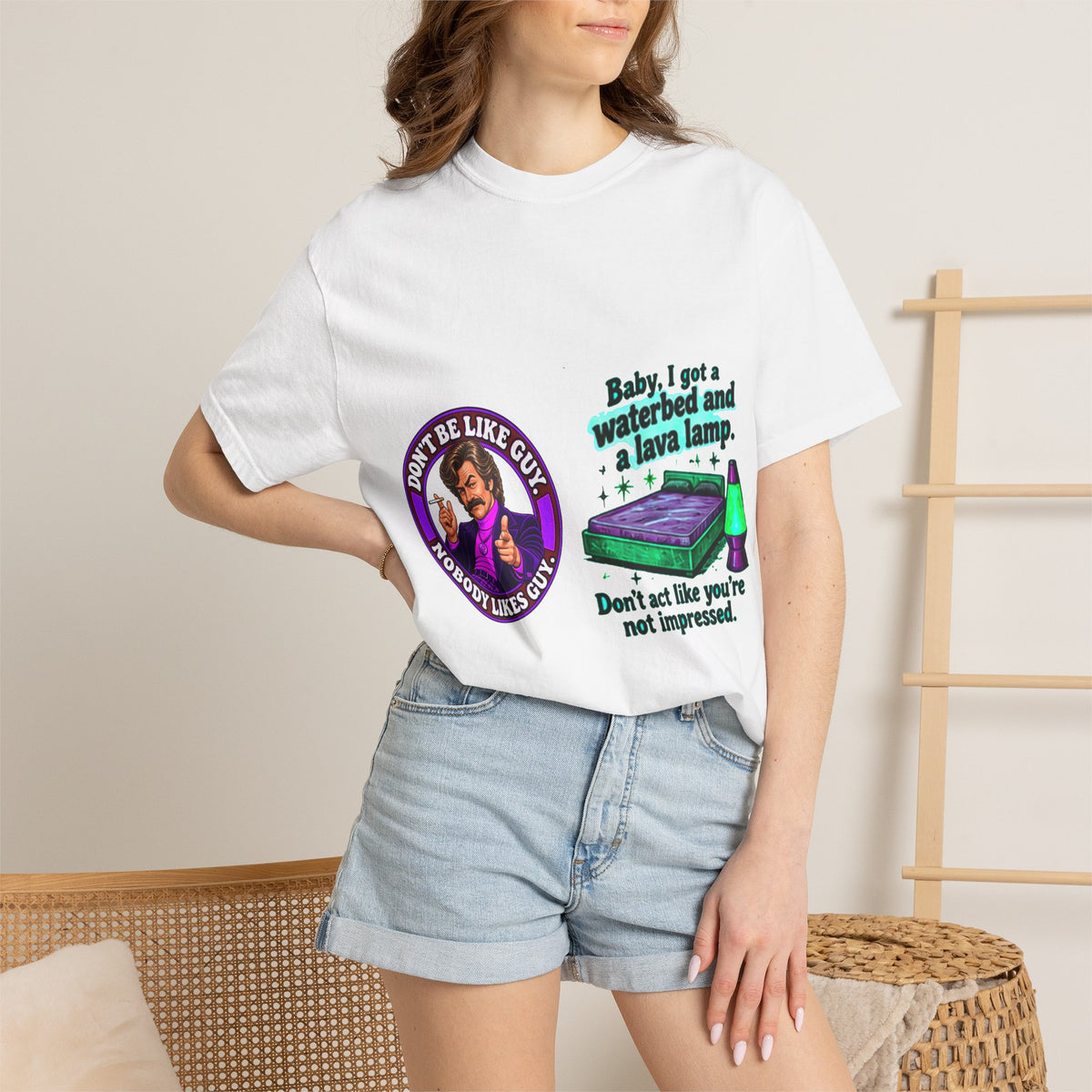 Model wearing the retro graphic t-shirt with waterbed and lava lamp design