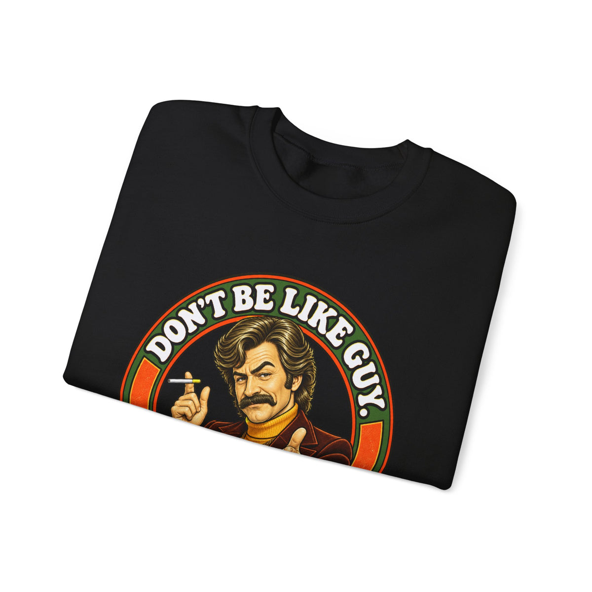 Folded black crewneck showing Don’t Be Like Guy graphic