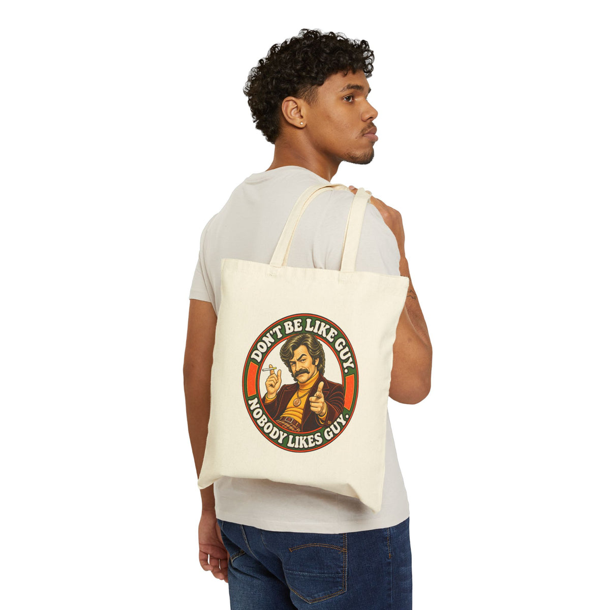 Person carrying natural canvas tote with retro humor graphic