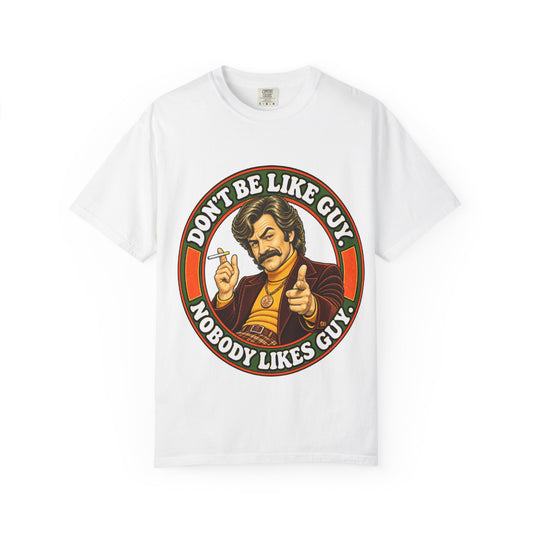 White t-shirt with retro 'Don’t Be Like Guy' graphic showing mustached man pointing and smoking
