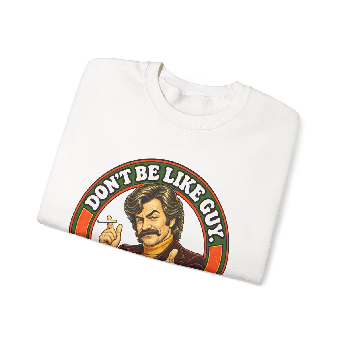 Folded white crewneck showing Don’t Be Like Guy graphic
