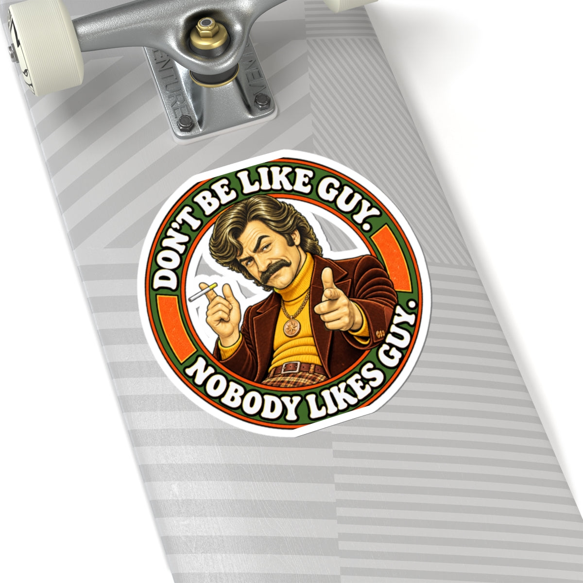 Sticker on skateboard deck near trucks
