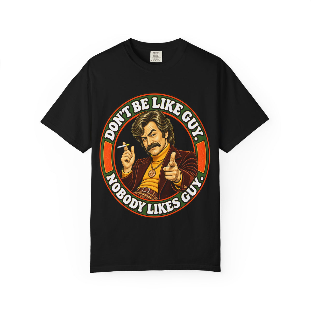 Black t-shirt with 'Don't Be Like Guy Nobody Likes Guy' retro illustration on front