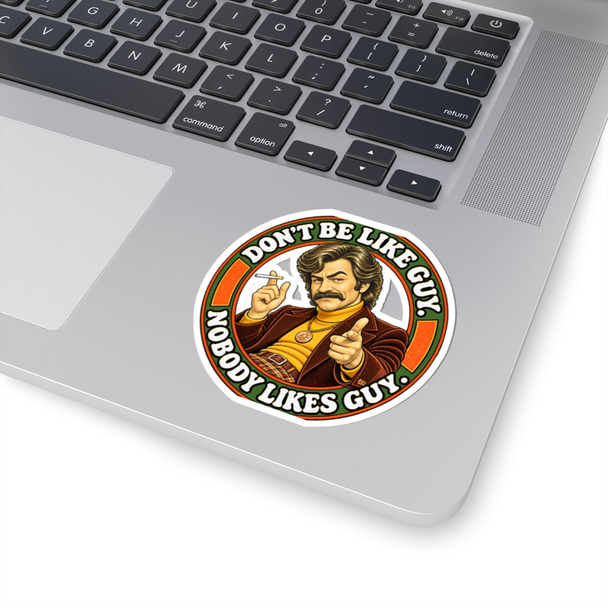 Sticker on laptop near keyboard