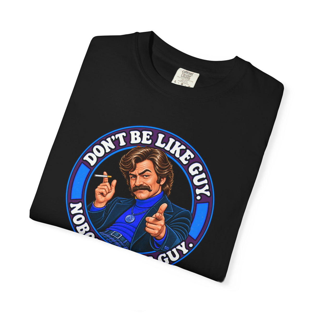 Folded black t-shirt with Don’t Be Like Guy cartoon print