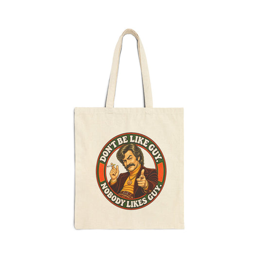 Natural canvas tote bag with retro 'Don't Be Like Guy. Nobody Likes Guy.' graphic