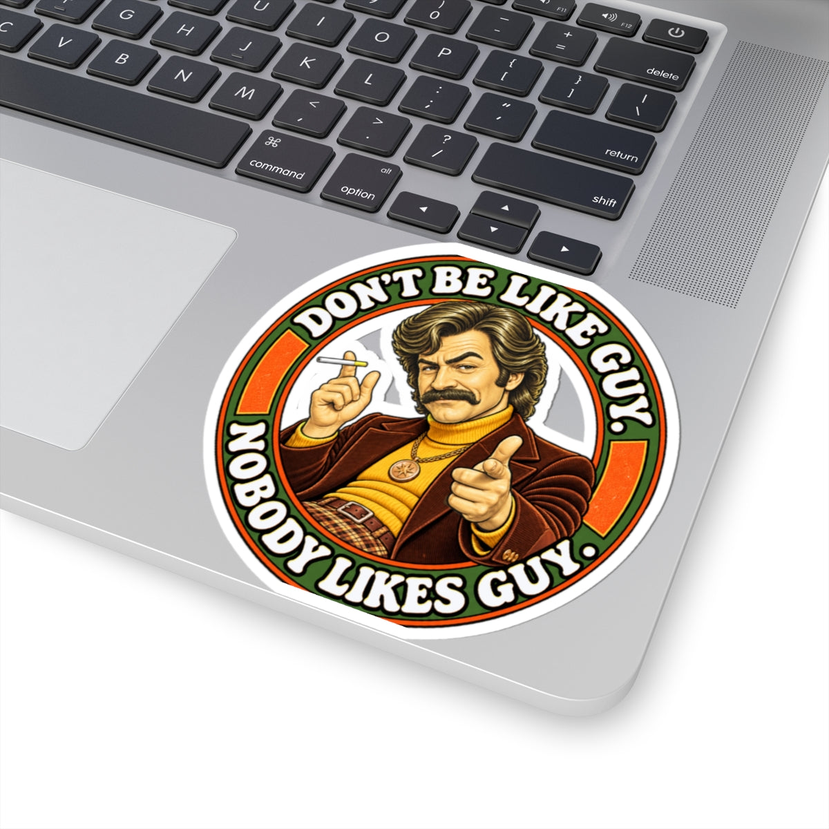Large sticker on laptop near keyboard